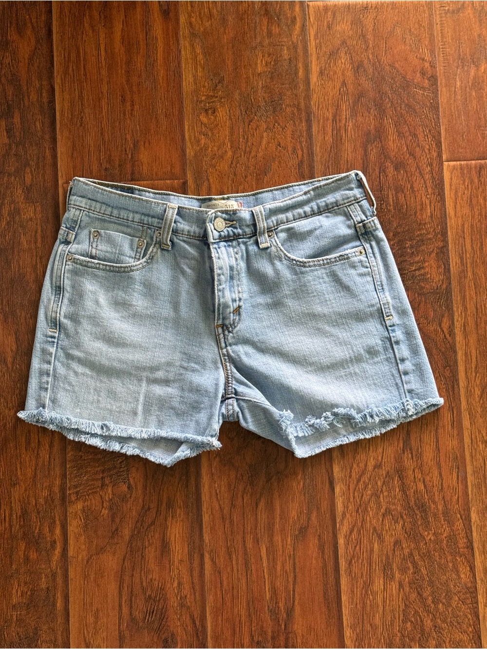 Levi's Light Blue Frayed Hem Denim Shorts